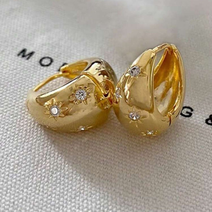Gold geometric earrings with rhinestone detail in bold hip-hop style shop at spotngrab lebanon