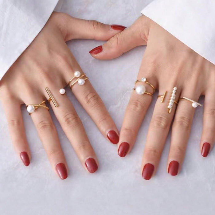 Yellow gold rings with pearl details – elegant holiday jewelry