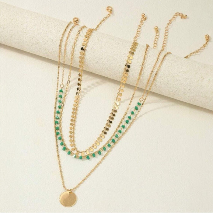 Layered gold-tone bohemian necklace set with turquoise pendants – 4 pieces available at spotngrab lebanon