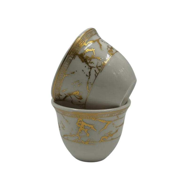Set of 12 white and gold porcelain coffee cups on Spotngrab Lebanon.