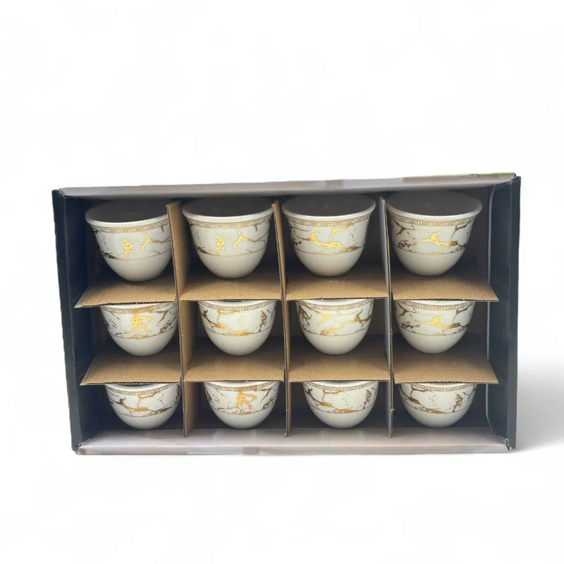 Set of 12 white and gold porcelain coffee cups on Spotngrab Lebanon.