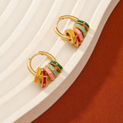 Gold hoop earrings with pastel enamel clover and geometric charm accents available at spotngrab lebanon