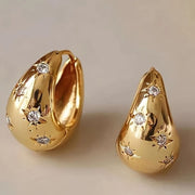 Gold geometric earrings with rhinestone detail in bold hip-hop style shop at spotngrab lebanon