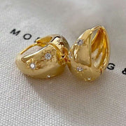 Gold geometric earrings with rhinestone detail in bold hip-hop style shop at spotngrab lebanon