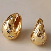 Gold geometric earrings with rhinestone detail in bold hip-hop style shop at spotngrab lebanon