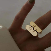 Set of two gold open cuff rings with abstract figure and heart design shop at spotngrab.com lebanon