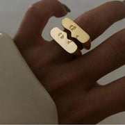 Set of two gold open cuff rings with abstract figure and heart design shop at spotngrab.com lebanon