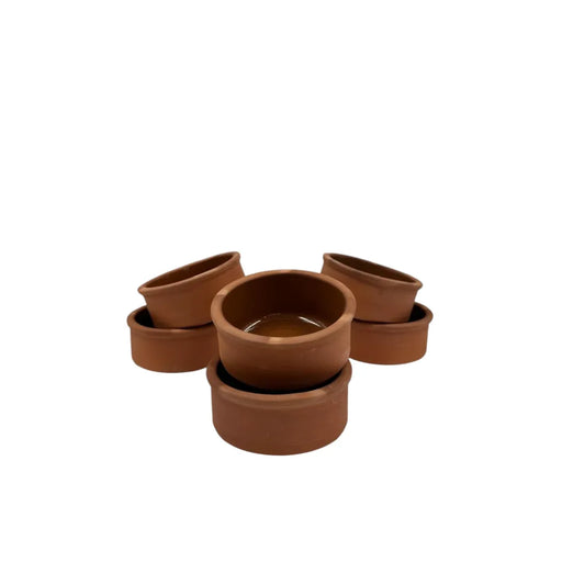 A set of six small 11x5cm round clay cooking pots showing a glossy glazed interior and matte terracotta red clay exterior on Spotngrab Lebanon.