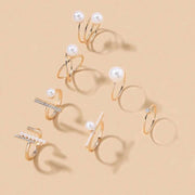Yellow gold rings with pearl details – elegant holiday jewelry