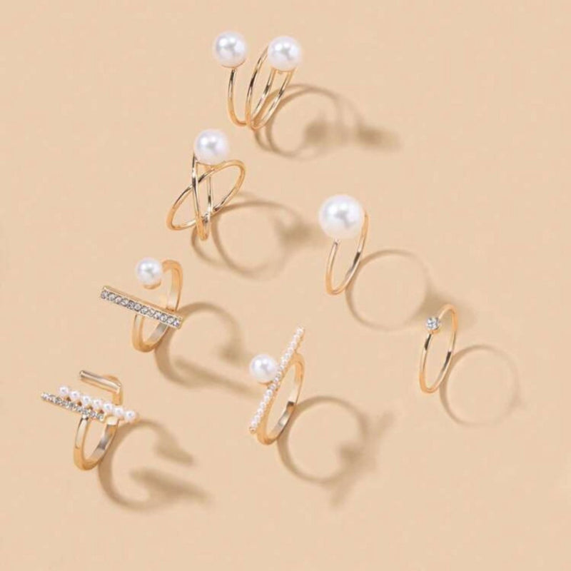 Yellow gold rings with pearl details – elegant holiday jewelry