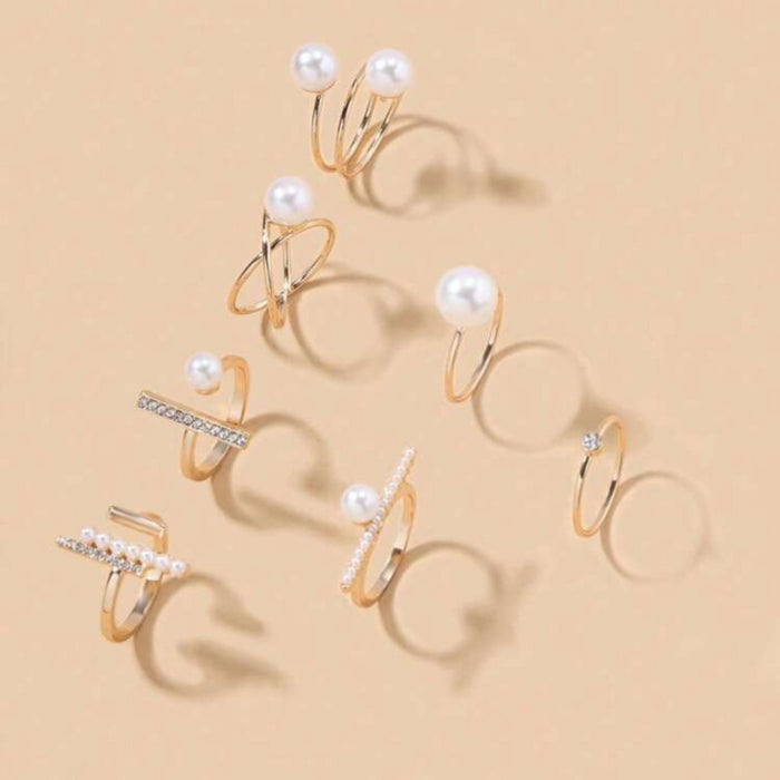 Yellow gold rings with pearl details – elegant holiday jewelry