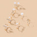 Yellow gold rings with pearl details – elegant holiday jewelry
