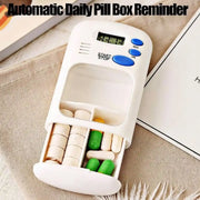 Automatic daily pill box reminder with digital timer, alarm buttons, and pull-out drawer on Spotngrab Lebanon.