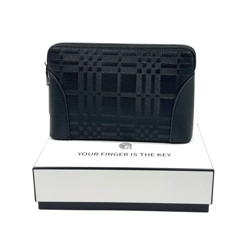 Black patterned leather biometric security clutch bag resting on a white presentation box on Spotngrab Lebanon.