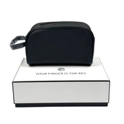 Black PU travel pouch with a biometric fingerprint lock resting on a white presentation box on Spotngrab Lebanon.