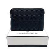 Black checkered smart clutch bag with a biometric fingerprint lock sitting on top of a white box on Spotngrab Lebanon.