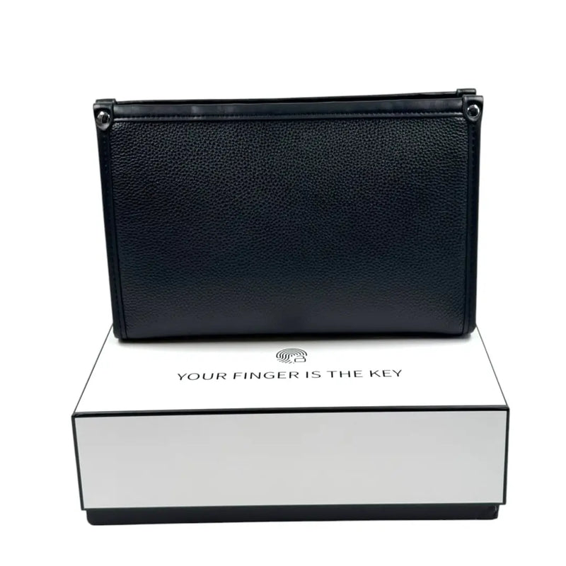 Black leather men's business clutch bag with a biometric fingerprint lock resting on a white box on Spotngrab Lebanon.
