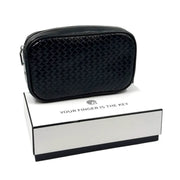 Black woven-leather smart clutch bag with a biometric fingerprint lock sitting on top of a white box on Spotngrab Lebanon.