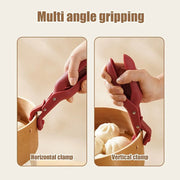 Multi-function anti-scalding clip lifting a cast iron pot lid - Kitchen accessories available at SpotNGrab