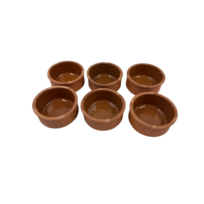 A set of six small 11x5cm round clay cooking pots showing a glossy glazed interior and matte terracotta red clay exterior on Spotngrab Lebanon.