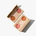 Dali Trio Face Palette with bronzer, blush, and highlighter in one compact for a radiant, sculpted glow