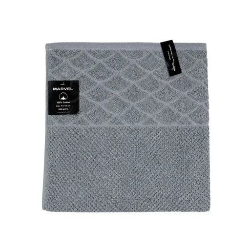 Marvel 100 percent cotton textured scallop bath towel 70x140cm with product tag on Spotngrab Lebanon.