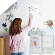 Magic sponge removing kids drawings and graffiti from wall