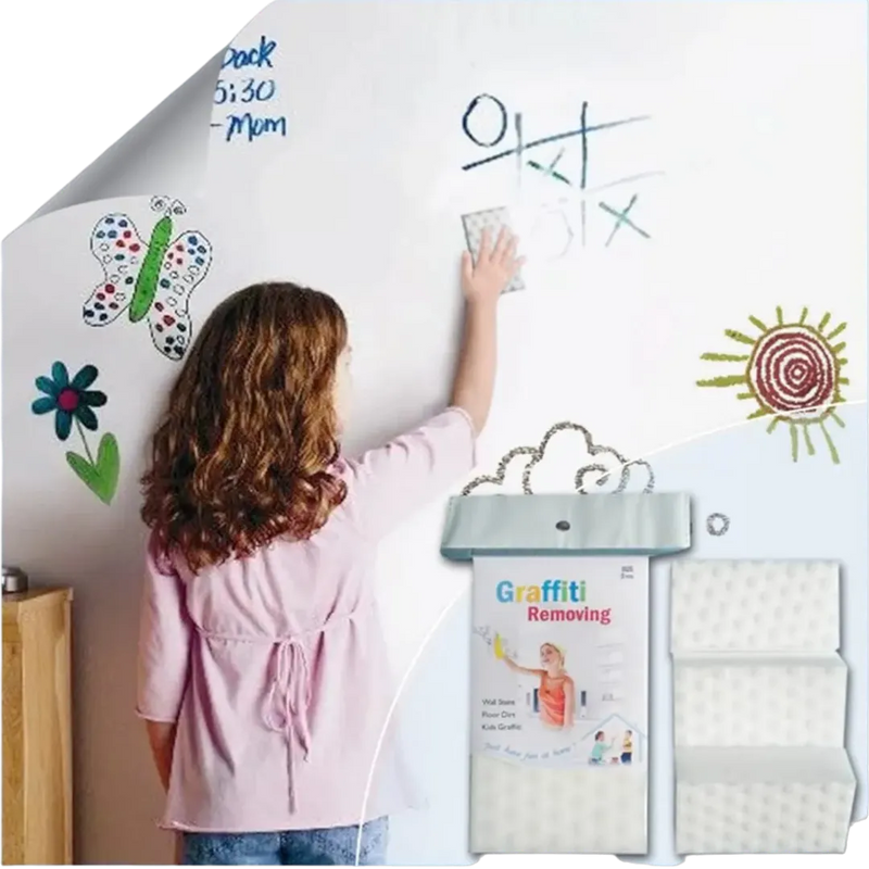 Magic sponge removing kids drawings and graffiti from wall