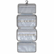 Grey four-layered hanging travel toiletry and cosmetic organizer bag shown open and hung on Spotngrab Lebanon.