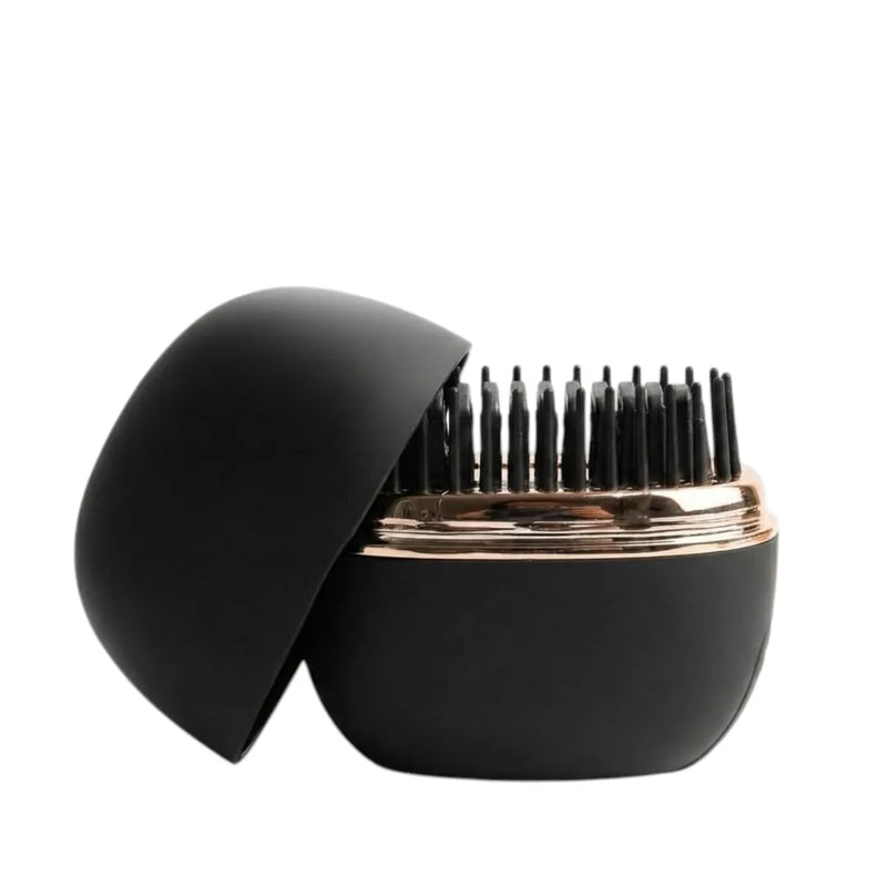 JY-602 USB-rechargeable wireless hair straightening brush in matte black and rose gold with protective cap on Spotngrab Lebanon.
