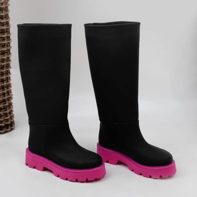 Black contrasting chunky sole knee high boots from Spotngrab Lebanon