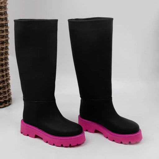 Black contrasting chunky sole knee high boots from Spotngrab Lebanon