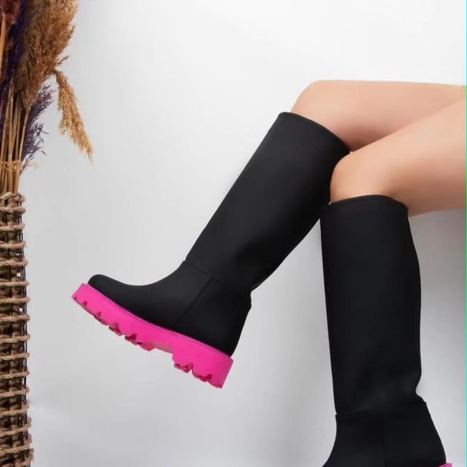 Black contrasting chunky sole knee high boots from Spotngrab Lebanon
