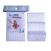 Magic sponge removing kids drawings and graffiti from wall