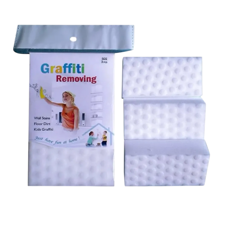 Magic sponge removing kids drawings and graffiti from wall