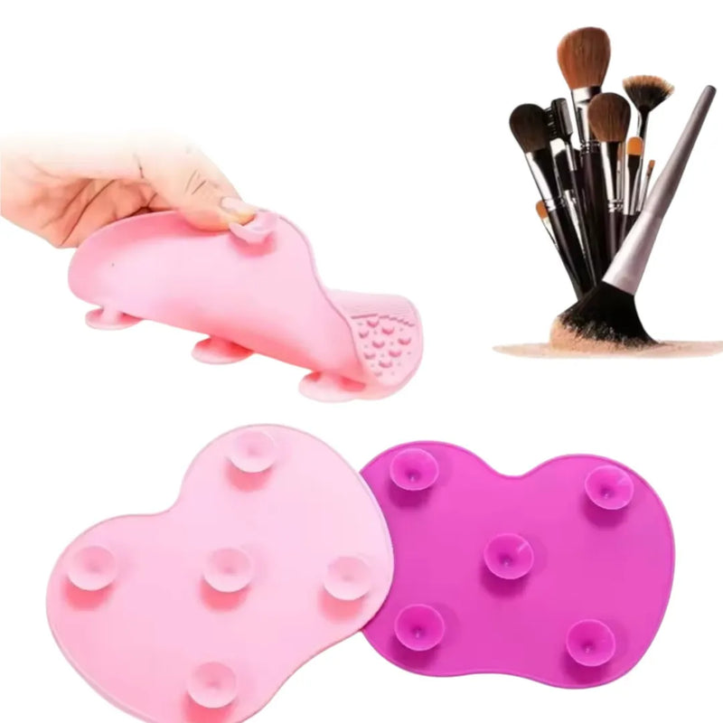 Silicone makeup brush cleaning mat with suction cups on a bathroom sink in Lebanon.