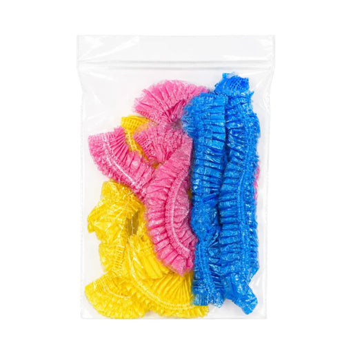 Pack of 9 pcs multicolored disposable plastic shower caps in bright pink, blue, and yellow colors on Spotngrab Lebanon.