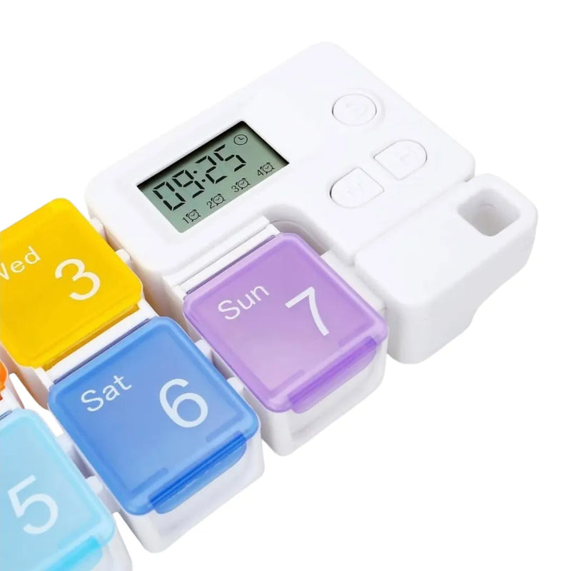 Close-up of the digital LCD screen and setting buttons on the 7-day smart pill box on Spotngrab Lebanon.