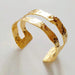 Minimalist gold open bangle bracelet with multi-element accents for daily casual wear Availabel at spotngrab lebanon