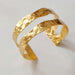 Minimalist gold open bangle bracelet with multi-element accents for daily casual wear Availabel at spotngrab lebanon