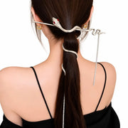 Striking silver snake hairpin with winding serpentine body and rhinestone tassel chains on Spotngrab Lebanon.