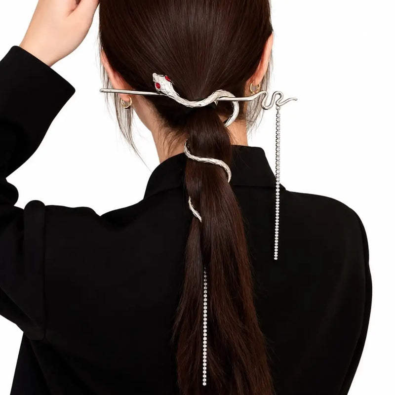 Striking silver snake hairpin with winding serpentine body and rhinestone tassel chains on Spotngrab Lebanon.
