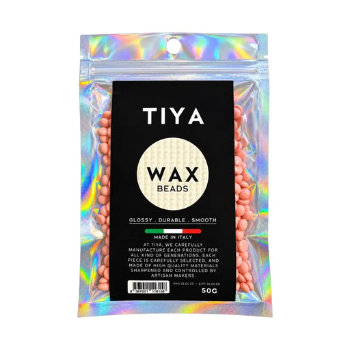 Tiya Wax Beads 50g holographic zip pouch displaying pink hard wax beans on Spotngrab Lebanon.