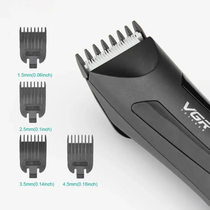 VGR V-951 grooming kit showing 4 guide combs and USB charging cable on Spotngrab.