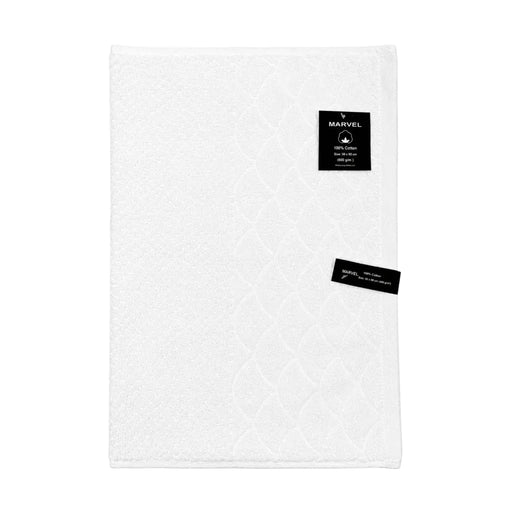 MARVEL 100 percent cotton textured scallop hand towel 50x90cm showing product tag on Spotngrab Lebanon.