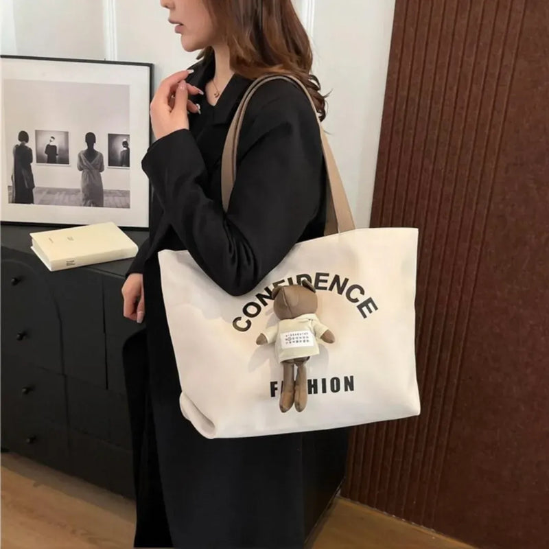 Stylish woman in Beirut carrying off-white 18L tote bag for university and work