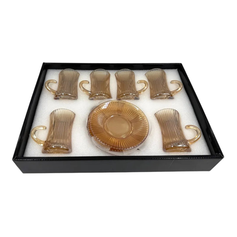 A complete 12-piece in a box amber glass tea service set showing six 100ml vertical ribbed cups with handles sitting on their matching fluted saucers on Spotngrab Lebanon.