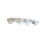 12-piece white porcelain chaffe coffee cup set without saucers neatly stacked on Spotngrab Lebanon.