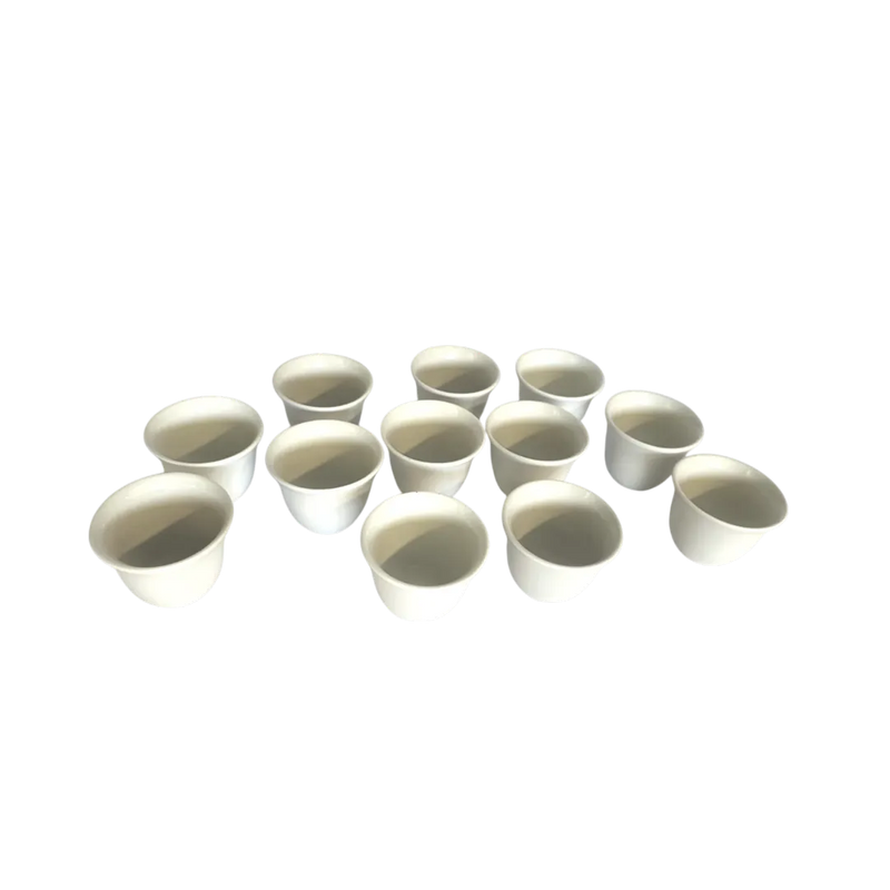 12-piece white porcelain chaffe coffee cup set without saucers neatly stacked on Spotngrab Lebanon.