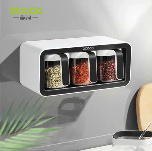 ecoco Wall-mounted spice rack with three transparent containers holding spices, branded 'ecoco' available at spotngrab lebanon